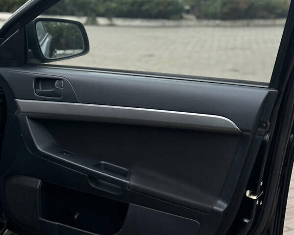 Чорний Міцубісі Lancer, об'ємом двигуна 1.5 л та пробігом 111 тис. км за 6999 $, фото 55 на Automoto.ua