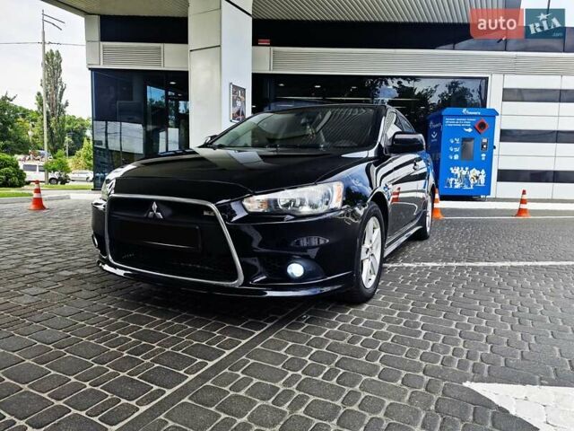 Чорний Міцубісі Lancer, об'ємом двигуна 2 л та пробігом 240 тис. км за 7850 $, фото 4 на Automoto.ua