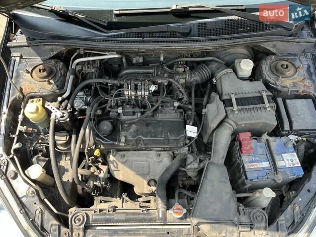Чорний Міцубісі Lancer, об'ємом двигуна 1.6 л та пробігом 296 тис. км за 4200 $, фото 12 на Automoto.ua