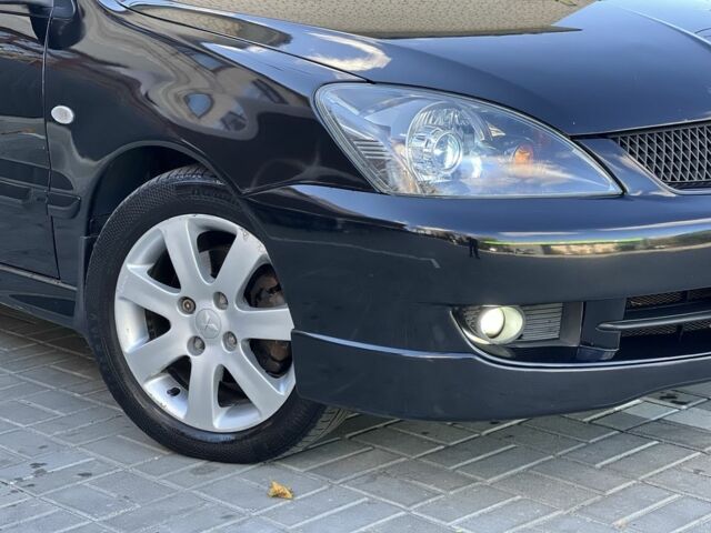 Міцубісі Lancer 2008 у Синельниковом на Automoto.ua Чорний Міцубісі Lancer, об'ємом двигуна 1.6 л та пробігом 230 тис. км за 4500 $, фото 5 на Automoto.ua