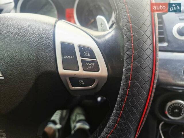 Чорний Міцубісі Lancer, об'ємом двигуна 2 л та пробігом 240 тис. км за 7850 $, фото 27 на Automoto.ua