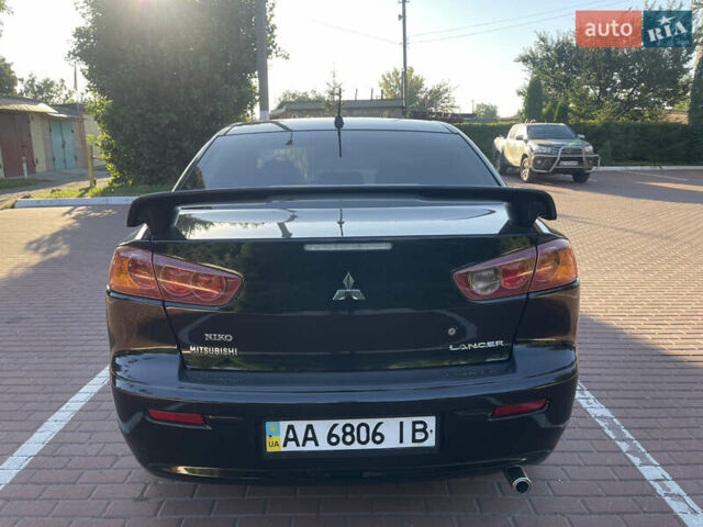 Черный Мицубиси Лансер, объемом двигателя 1.5 л и пробегом 263 тыс. км за 5300 $, фото 4 на Automoto.ua