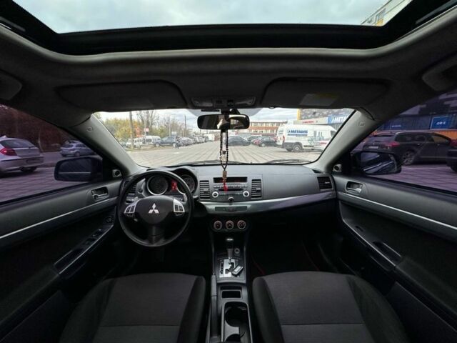 Чорний Міцубісі Lancer, об'ємом двигуна 2 л та пробігом 236 тис. км за 7900 $, фото 4 на Automoto.ua