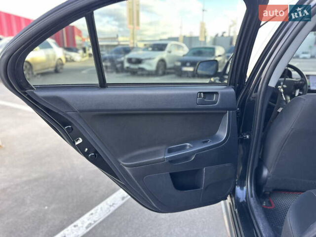 Чорний Міцубісі Lancer, об'ємом двигуна 2 л та пробігом 290 тис. км за 5900 $, фото 22 на Automoto.ua