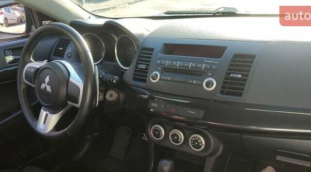 Чорний Міцубісі Lancer, об'ємом двигуна 2 л та пробігом 134 тис. км за 29034 $, фото 4 на Automoto.ua