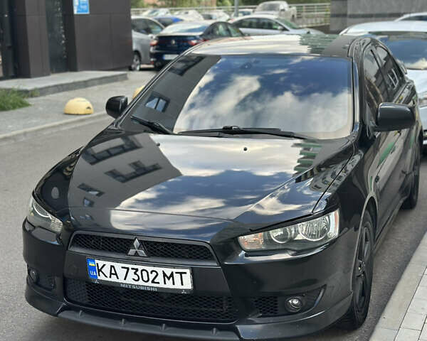 Черный Мицубиси Лансер, объемом двигателя 2 л и пробегом 295 тыс. км за 7000 $, фото 8 на Automoto.ua