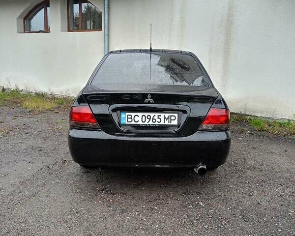 Мицубиси Лансер 2008 в Львове на Automoto.ua Черный Мицубиси Лансер, объемом двигателя 1.58 л и пробегом 200 тыс. км за 5200 $, фото 219 на Automoto.ua