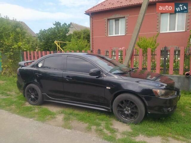 Чорний Міцубісі Lancer, об'ємом двигуна 2 л та пробігом 183 тис. км за 5000 $, фото 5 на Automoto.ua