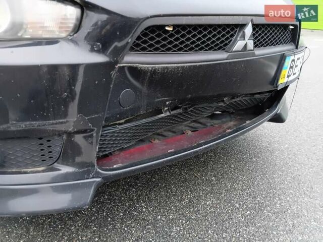 Чорний Міцубісі Lancer, об'ємом двигуна 2 л та пробігом 275 тис. км за 5200 $, фото 15 на Automoto.ua