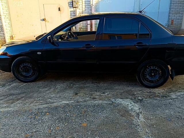 Черный Мицубиси Лансер, объемом двигателя 1.6 л и пробегом 230 тыс. км за 4700 $, фото 4 на Automoto.ua