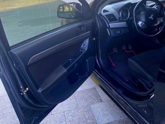Чорний Міцубісі Lancer, об'ємом двигуна 2 л та пробігом 220 тис. км за 6300 $, фото 4 на Automoto.ua