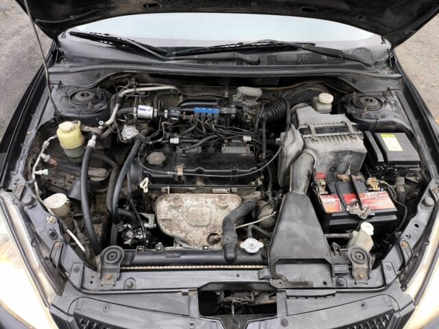 Черный Мицубиси Лансер, объемом двигателя 1.6 л и пробегом 243 тыс. км за 3200 $, фото 9 на Automoto.ua