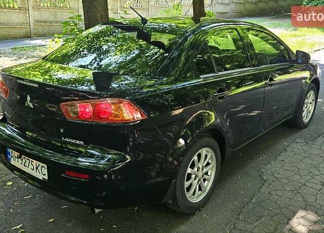 Черный Мицубиси Лансер, объемом двигателя 1.5 л и пробегом 205 тыс. км за 6300 $, фото 7 на Automoto.ua