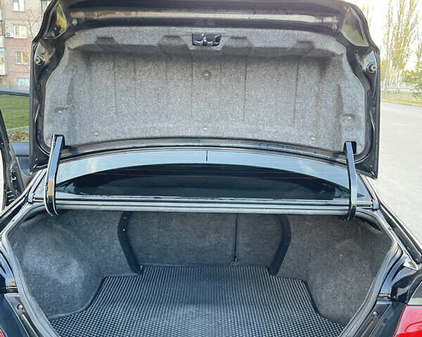 Черный Мицубиси Лансер, объемом двигателя 1.59 л и пробегом 348 тыс. км за 4200 $, фото 5 на Automoto.ua