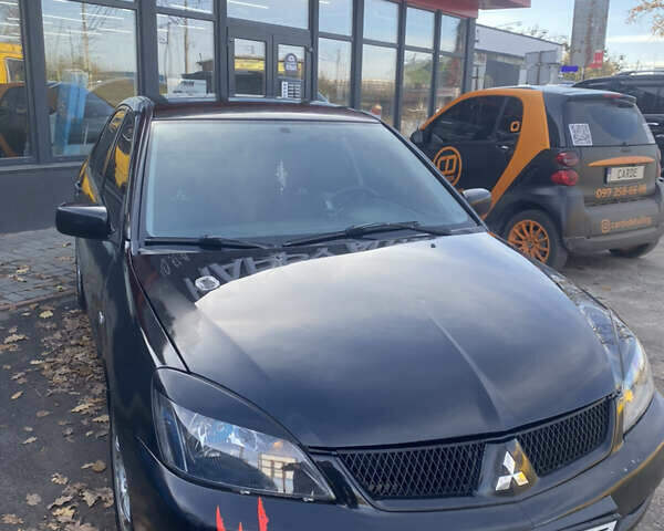 Мицубиси Лансер 2008 в Киеве на Automoto.ua Черный Мицубиси Лансер, объемом двигателя 1.6 л и пробегом 72 тыс. км за 2650 $, фото 1 на Automoto.ua