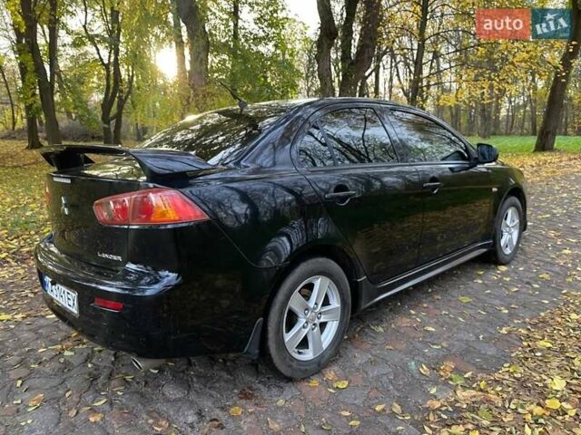 Чорний Міцубісі Lancer, об'ємом двигуна 2 л та пробігом 237 тис. км за 7500 $, фото 13 на Automoto.ua