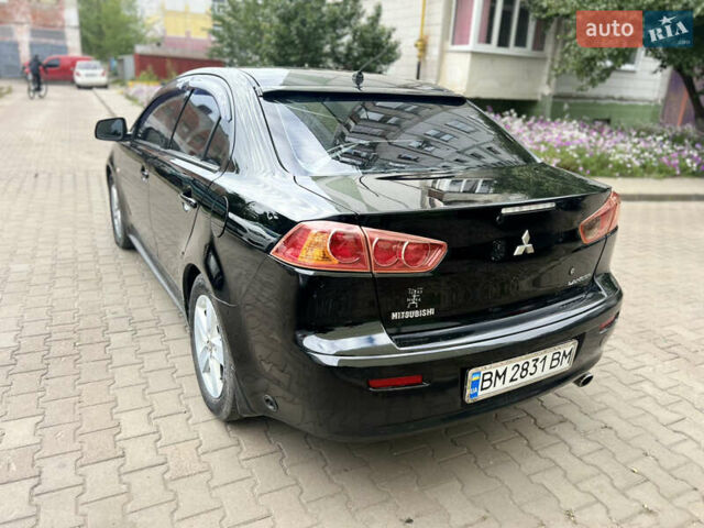 Черный Мицубиси Лансер, объемом двигателя 1.5 л и пробегом 223 тыс. км за 5899 $, фото 3 на Automoto.ua
