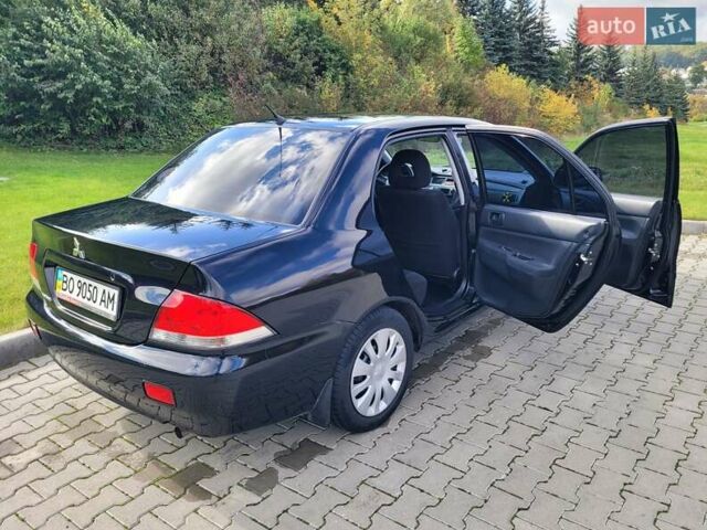 Міцубісі Lancer 2008 у Тернополі на Automoto.ua Чорний Міцубісі Lancer, об'ємом двигуна 1.58 л та пробігом 182 тис. км за 5600 $, фото 11 на Automoto.ua