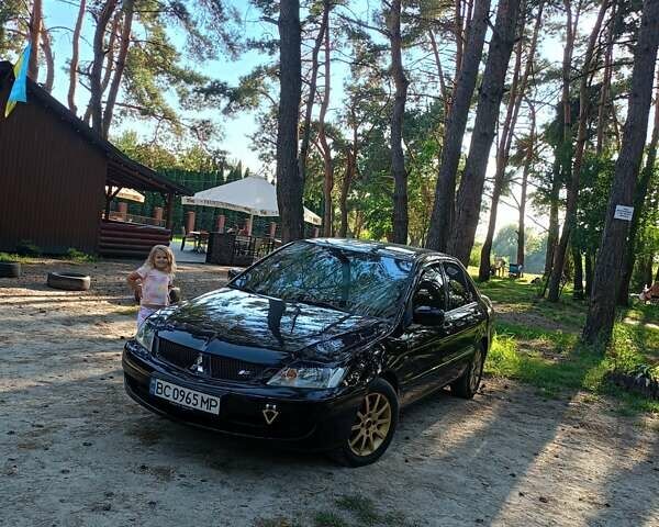 Мицубиси Лансер 2008 в Львове на Automoto.ua Черный Мицубиси Лансер, объемом двигателя 1.58 л и пробегом 200 тыс. км за 5200 $, фото 206 на Automoto.ua
