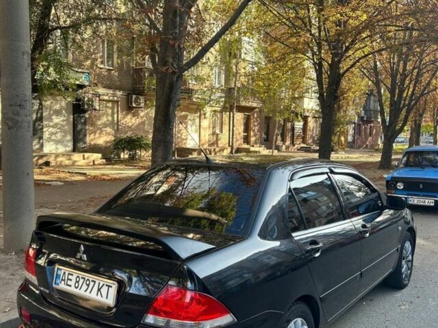 Міцубісі Lancer 2008 у Кривому Розі на Automoto.ua Чорний Міцубісі Lancer, об'ємом двигуна 1.6 л та пробігом 230 тис. км за 4380 $, фото 4 на Automoto.ua