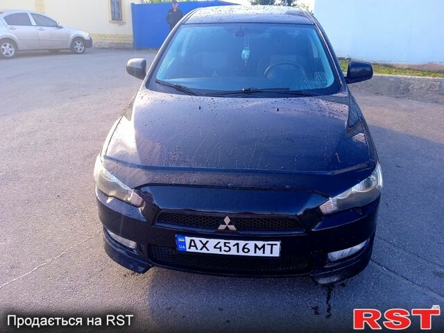 Черный Мицубиси Лансер, объемом двигателя 2 л и пробегом 156 тыс. км за 7100 $, фото 8 на Automoto.ua