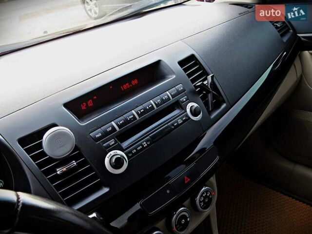 Мицубиси Лансер 2008 в Черкассах на Automoto.ua Черный Мицубиси Лансер, объемом двигателя 2 л и пробегом 178 тыс. км за 7400 $, фото 10 на Automoto.ua