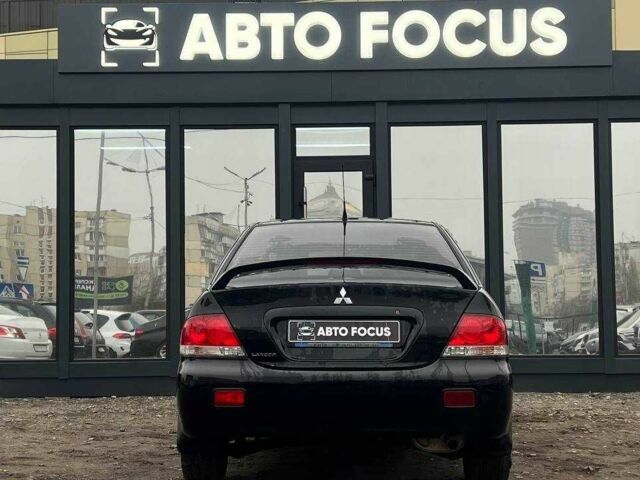 Чорний Міцубісі Lancer, об'ємом двигуна 0 л та пробігом 340 тис. км за 6190 $, фото 6 на Automoto.ua