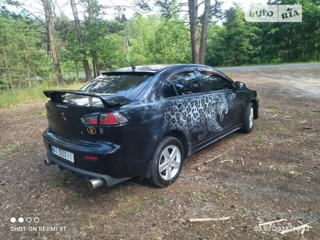 Чорний Міцубісі Lancer, об'ємом двигуна 2 л та пробігом 150 тис. км за 7600 $, фото 10 на Automoto.ua