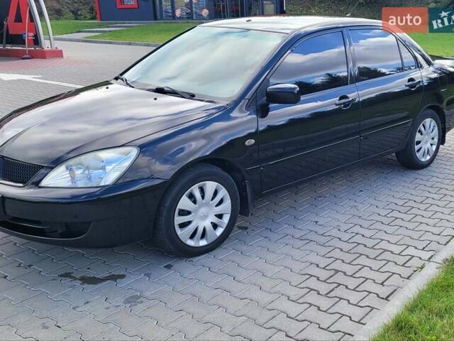 Міцубісі Lancer 2008 у Тернополі на Automoto.ua Чорний Міцубісі Lancer, об'ємом двигуна 1.58 л та пробігом 182 тис. км за 5600 $, фото 3 на Automoto.ua