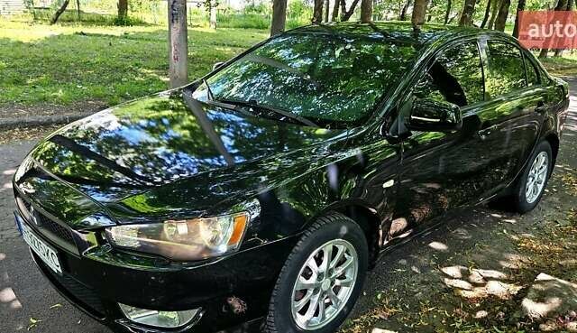 Черный Мицубиси Лансер, объемом двигателя 1.5 л и пробегом 205 тыс. км за 6300 $, фото 8 на Automoto.ua