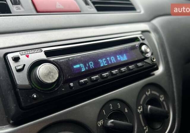 Чорний Міцубісі Lancer, об'ємом двигуна 1.6 л та пробігом 340 тис. км за 6190 $, фото 24 на Automoto.ua