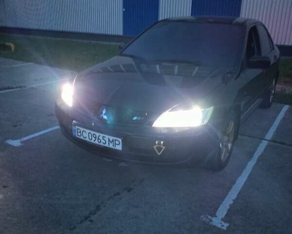 Мицубиси Лансер 2008 в Львове на Automoto.ua Черный Мицубиси Лансер, объемом двигателя 1.58 л и пробегом 200 тыс. км за 5200 $, фото 162 на Automoto.ua