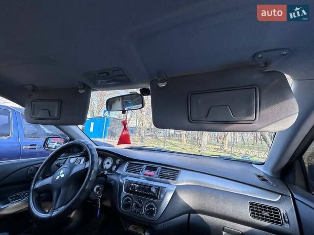 Чорний Міцубісі Lancer, об'ємом двигуна 1.6 л та пробігом 310 тис. км за 3500 $, фото 46 на Automoto.ua