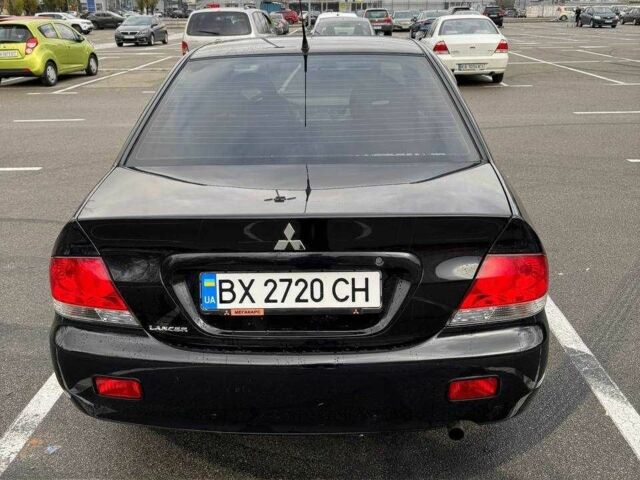 Чорний Міцубісі Lancer, об'ємом двигуна 1.6 л та пробігом 245 тис. км за 4500 $, фото 7 на Automoto.ua