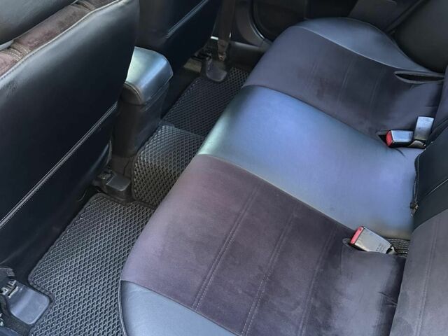 Чорний Міцубісі Lancer, об'ємом двигуна 2 л та пробігом 230 тис. км за 6650 $, фото 19 на Automoto.ua