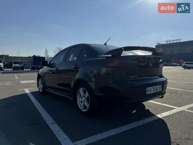 Чорний Міцубісі Lancer, об'ємом двигуна 2 л та пробігом 286 тис. км за 6450 $, фото 12 на Automoto.ua