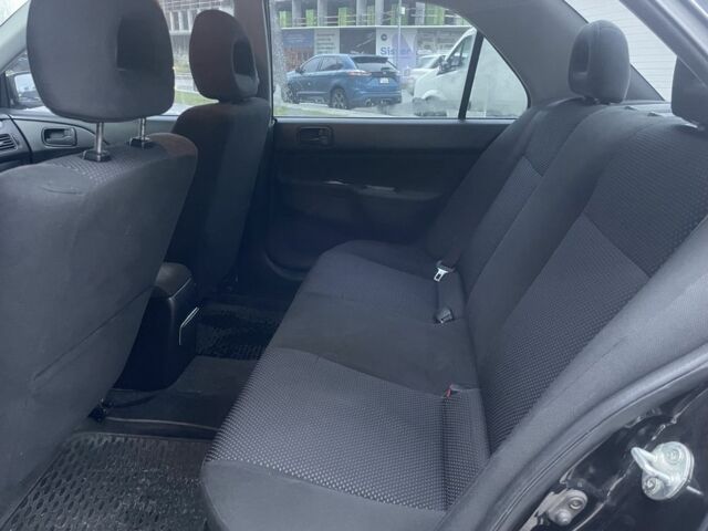 Черный Мицубиси Лансер, объемом двигателя 1.6 л и пробегом 226 тыс. км за 3750 $, фото 10 на Automoto.ua