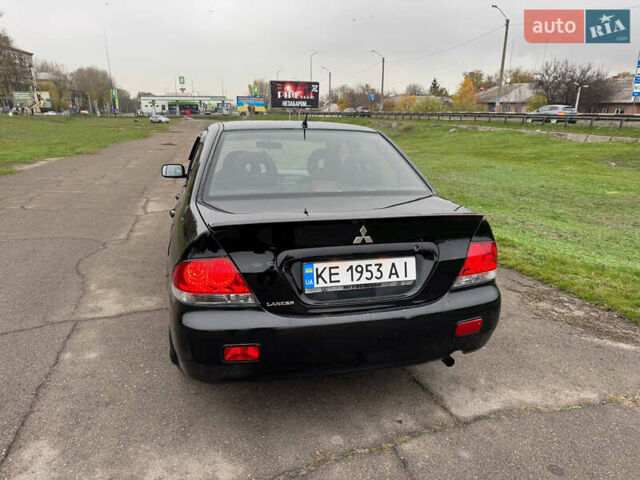 Чорний Міцубісі Lancer, об'ємом двигуна 1.6 л та пробігом 200 тис. км за 4500 $, фото 6 на Automoto.ua
