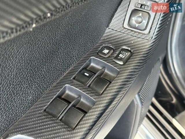 Чорний Міцубісі Lancer, об'ємом двигуна 2 л та пробігом 313 тис. км за 7690 $, фото 10 на Automoto.ua