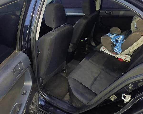 Чорний Міцубісі Lancer, об'ємом двигуна 1.5 л та пробігом 300 тис. км за 5500 $, фото 8 на Automoto.ua