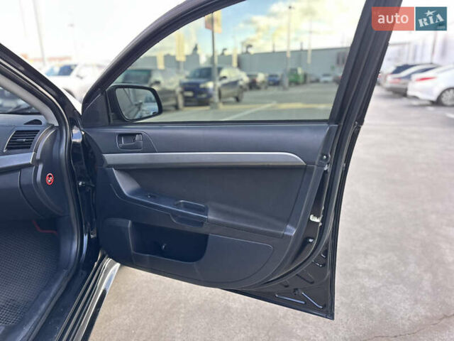 Чорний Міцубісі Lancer, об'ємом двигуна 2 л та пробігом 290 тис. км за 5900 $, фото 28 на Automoto.ua