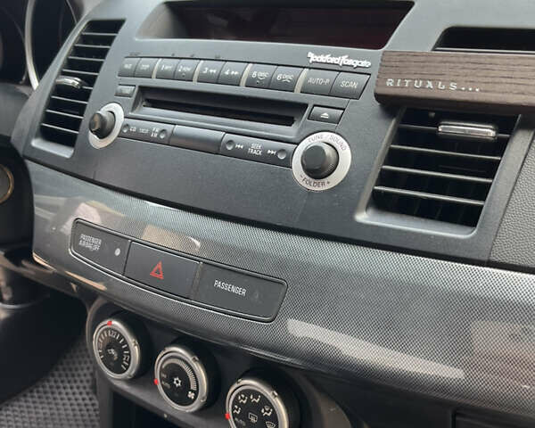 Мицубиси Лансер 2008 в Чернигове на Automoto.ua Черный Мицубиси Лансер, объемом двигателя 2 л и пробегом 254 тыс. км за 7500 $, фото 9 на Automoto.ua