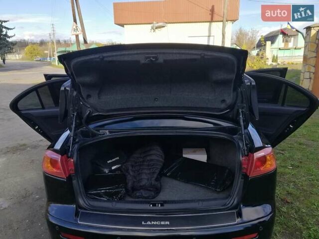 Мицубиси Лансер 2008 в Киеве на Automoto.ua Черный Мицубиси Лансер, объемом двигателя 2 л и пробегом 196 тыс. км за 5500 $, фото 28 на Automoto.ua