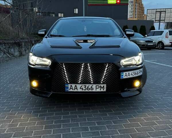 Чорний Міцубісі Lancer, об'ємом двигуна 2 л та пробігом 240 тис. км за 10500 $, фото 10 на Automoto.ua