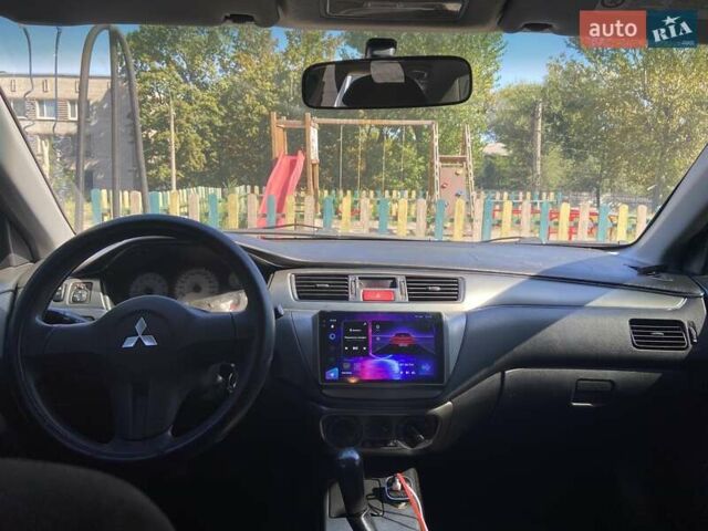 Чорний Міцубісі Lancer, об'ємом двигуна 1.58 л та пробігом 260 тис. км за 4800 $, фото 4 на Automoto.ua
