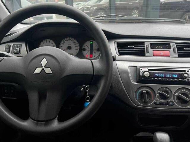 Чорний Міцубісі Lancer, об'ємом двигуна 0 л та пробігом 340 тис. км за 6190 $, фото 12 на Automoto.ua