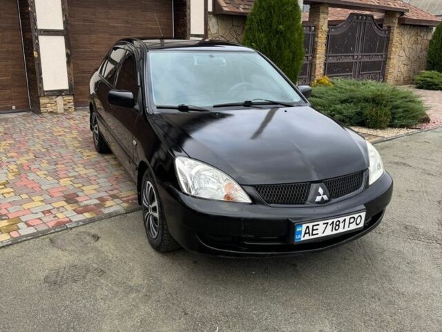 Чорний Міцубісі Lancer, об'ємом двигуна 1.6 л та пробігом 220 тис. км за 3600 $, фото 7 на Automoto.ua