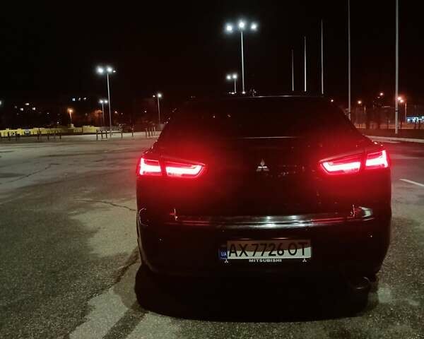 Черный Мицубиси Лансер, объемом двигателя 2 л и пробегом 240 тыс. км за 6400 $, фото 17 на Automoto.ua