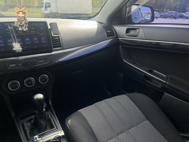 Чорний Міцубісі Lancer, об'ємом двигуна 2 л та пробігом 221 тис. км за 6300 $, фото 12 на Automoto.ua