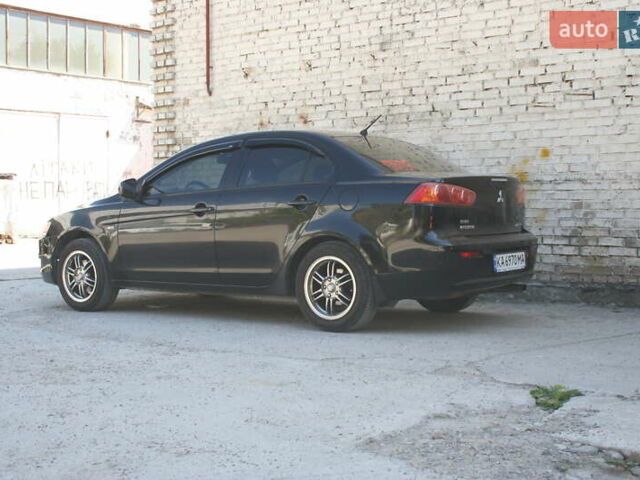 Черный Мицубиси Лансер, объемом двигателя 1.5 л и пробегом 110 тыс. км за 6950 $, фото 8 на Automoto.ua